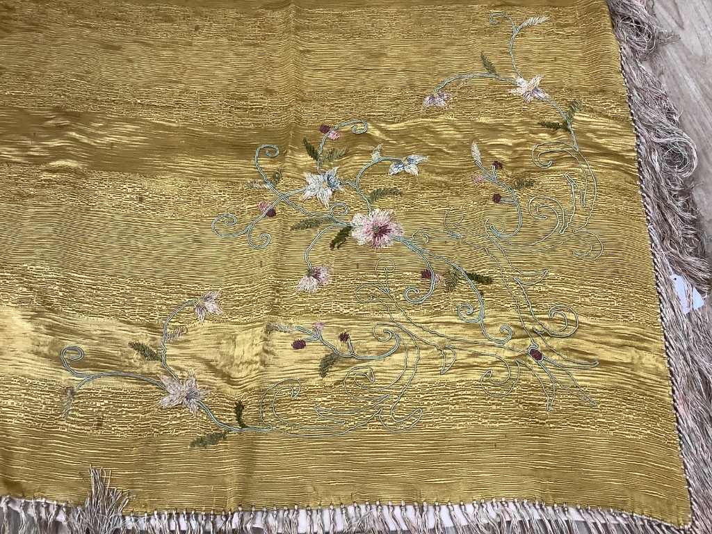 A late 19th century American silk and chenille work piano cover